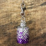 ST32123PUR-SMALL ROUND FLASK/PURPLE CRYSTAL /1 OZ.
