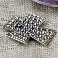 1017PL - PURPLE STONE CANDLE PIN W / CROSS